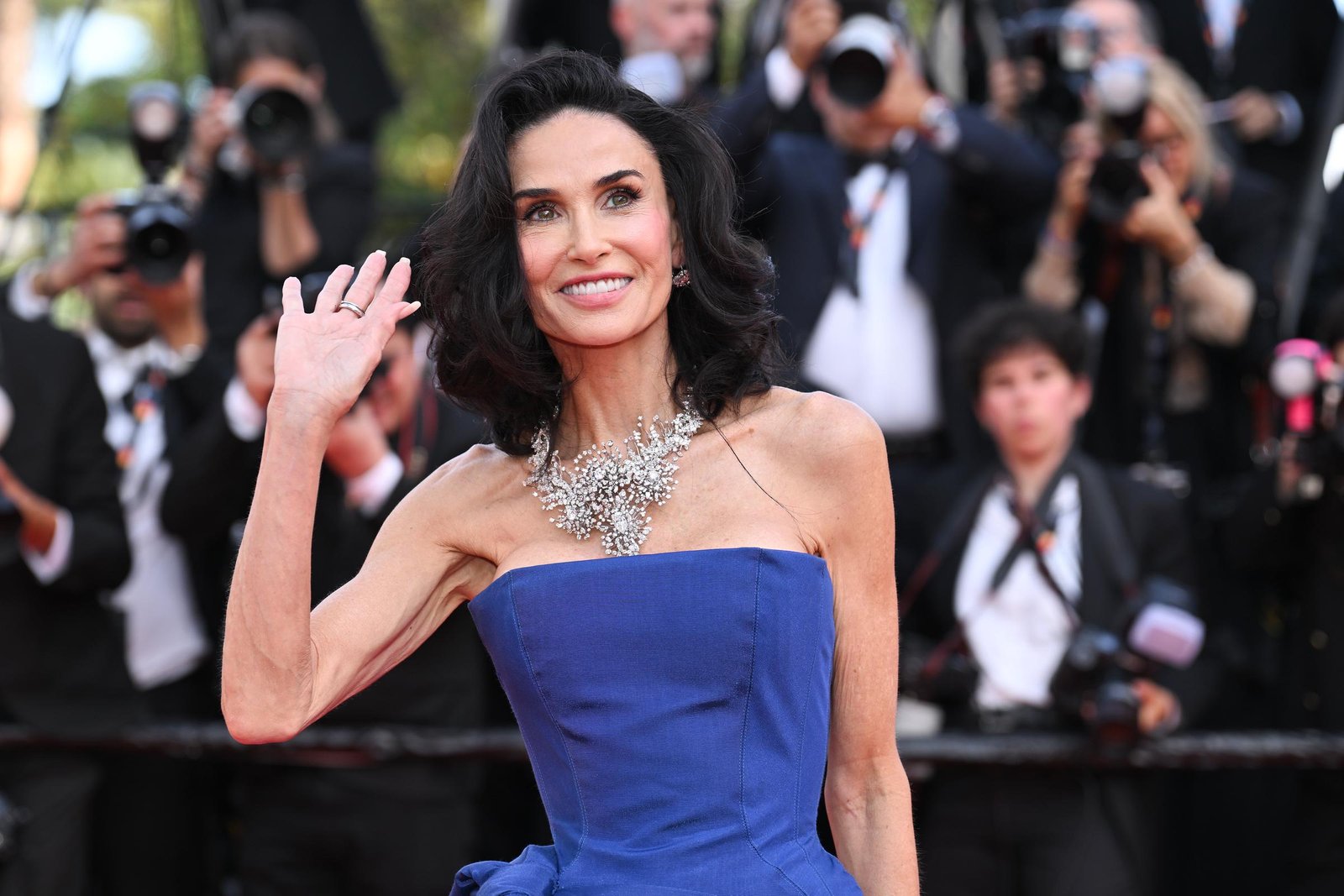 Demi Moore Shines in Blue After Bold Hair Transformation at Cannes – See the Stunning Photos 2 Demi Moore Shines in Blue After Bold Hair Transformation at