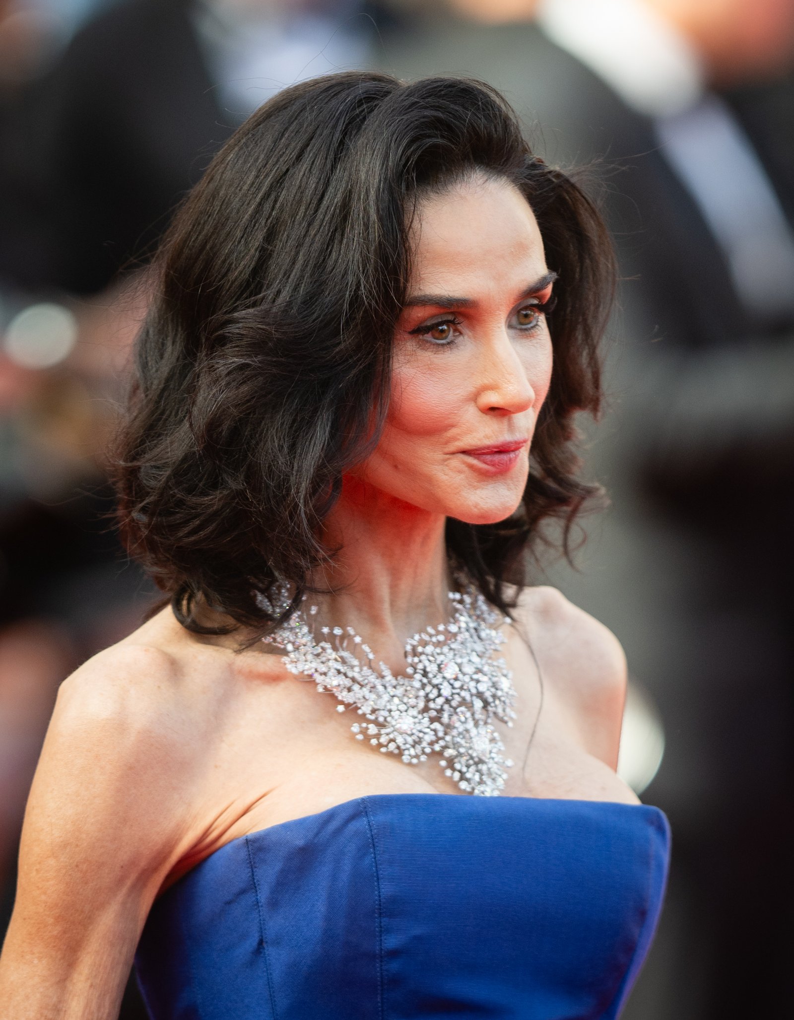 Demi Moore Shines in Blue After Bold Hair Transformation at Cannes – See the Stunning Photos 4 1790881741 507 Demi Moore Shines in Blue After Bold Hair Transformation at