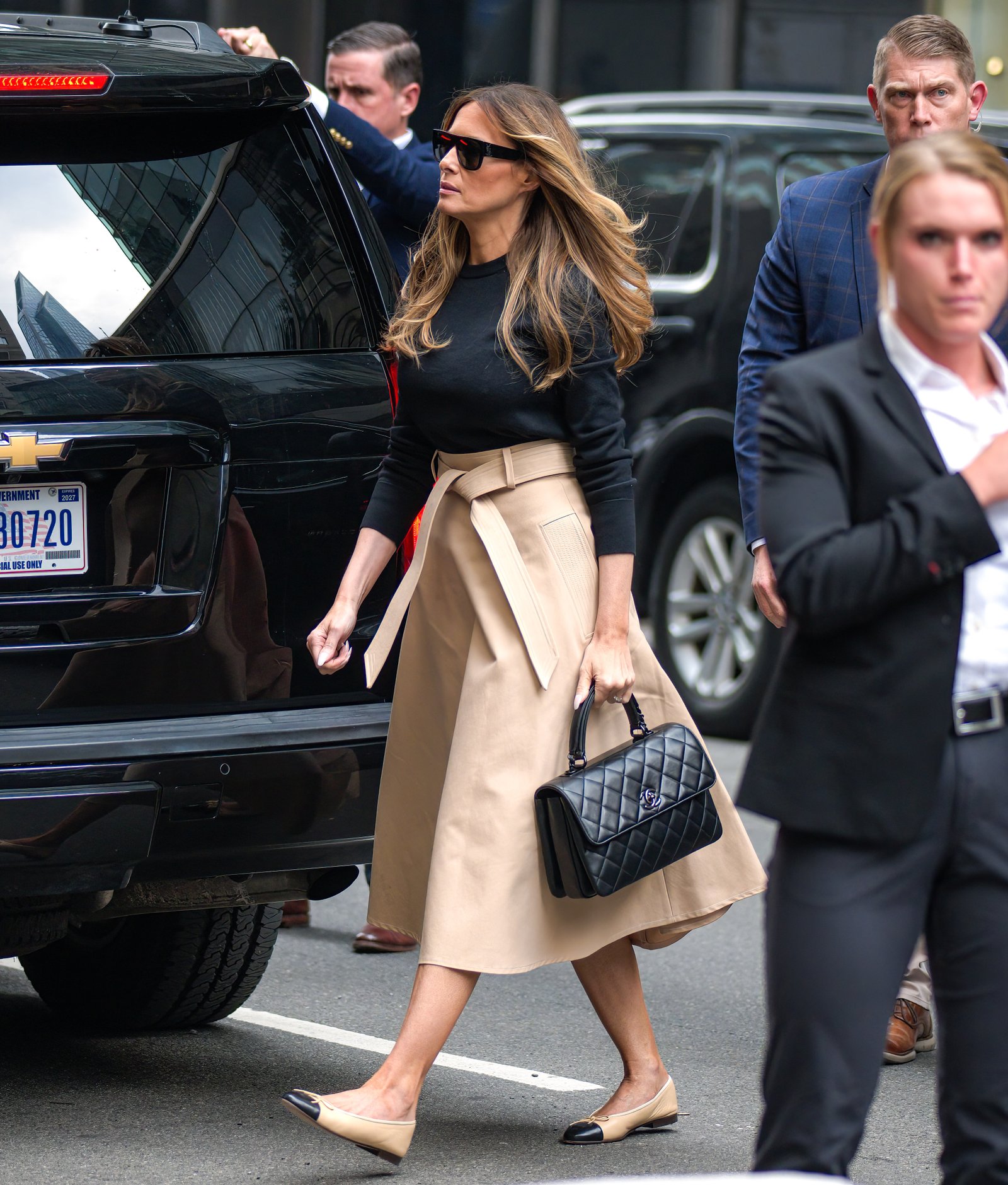 1793097133 455 Melania Trumps Election Day Outfit A Pale Blue Blouse Beige