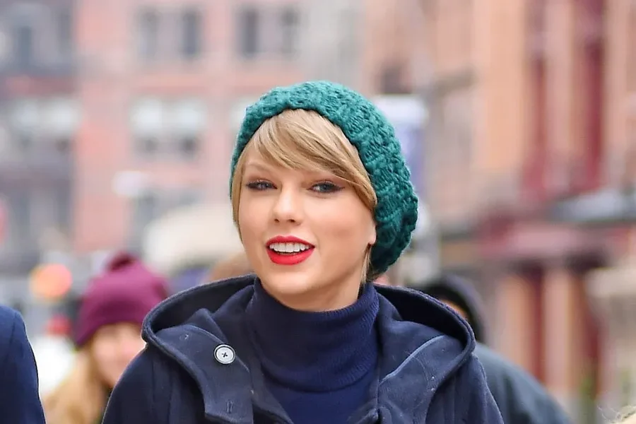Taylor Swift Stuns in Mini Dress Out in London Post-S rumored Wedding — Fans Notice a Special Detail
