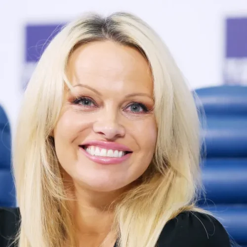 Pamela Anderson Turns Heads in a Pistachio Chiffon Skirt at