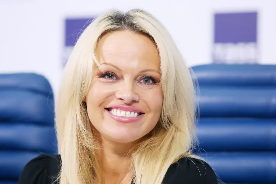 Pamela Anderson Turns Heads in a Pistachio Chiffon Skirt at